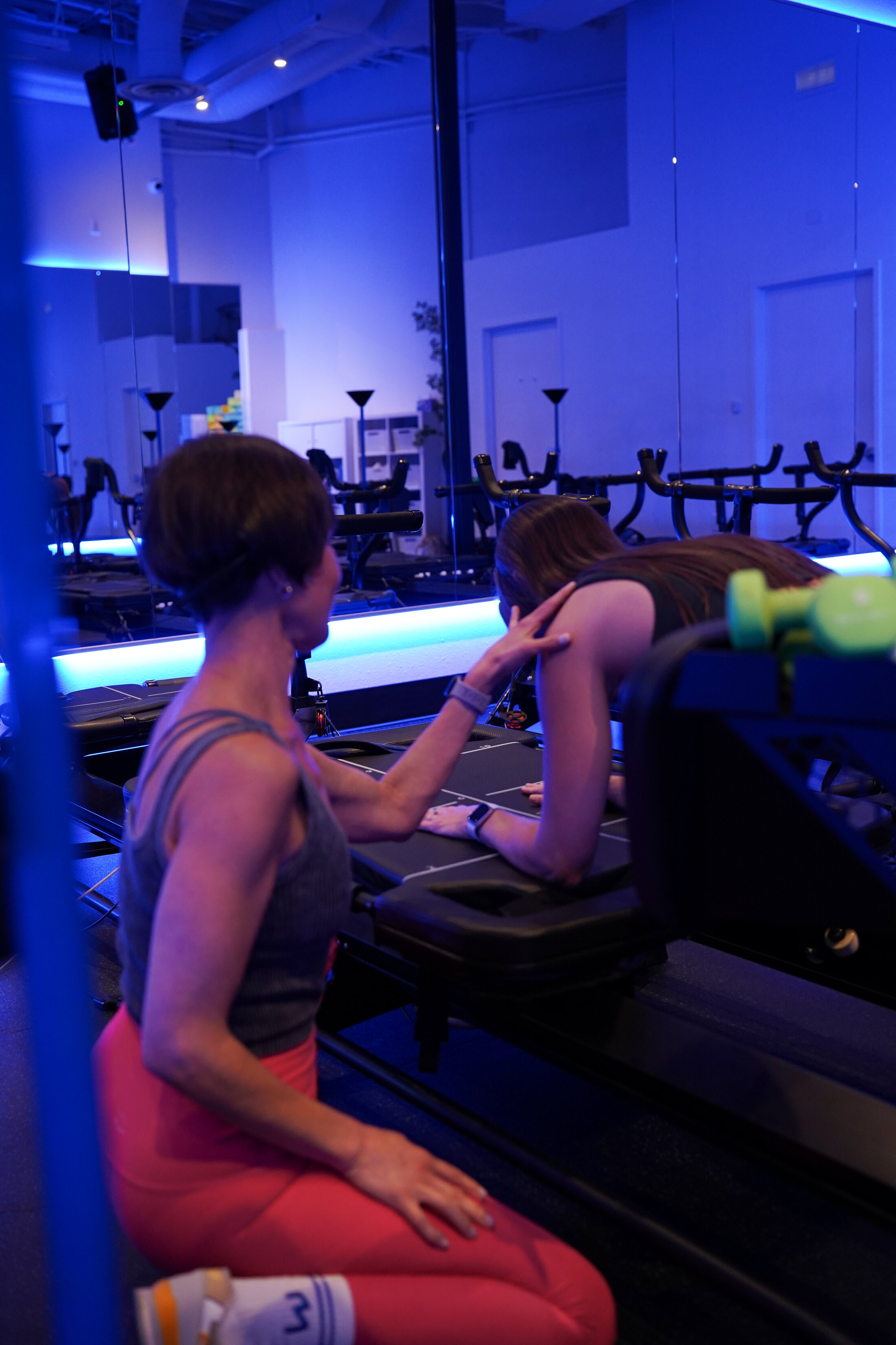 Megaform Eugene instructor coaching a client in the studio